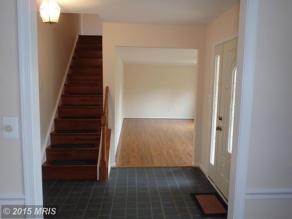 foyer looking towards living room and staircase