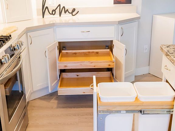 Pullout shelves and double trash