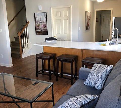 Open living room/kitchen with bar seating