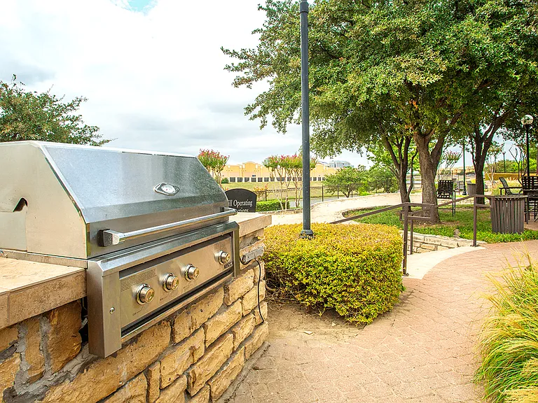 Sizzle and grill your favorites at our apartment's BBQ area