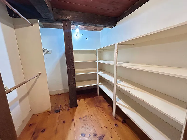 Walk-in closet in primary suite