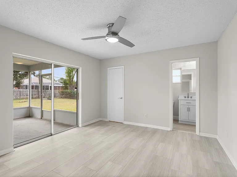 One of 2 primary bedrooms with private bath and walk-in closet