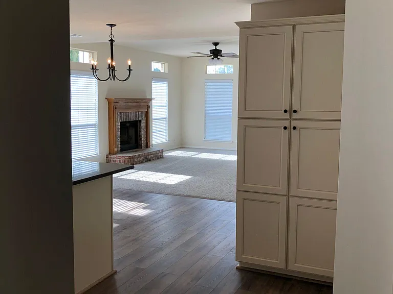 arched entry into kitchen and open living room