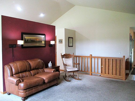 Open stairway. Vaulted ceiling