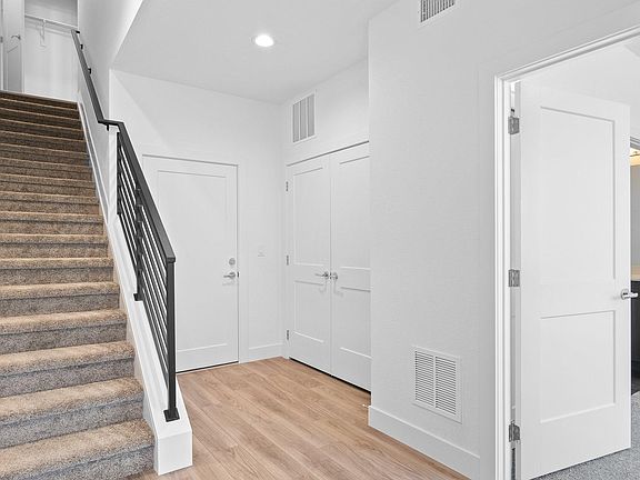Entryway leading in from front door or garage. First Floor secondary Bedroom Suite that can be used as office too. 5 piece bath attached.