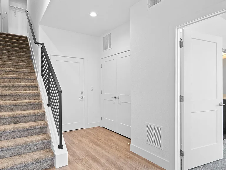 Entryway leading in from front door or garage. First Floor secondary Bedroom Suite that can be used as office too. 5 piece bath attached.