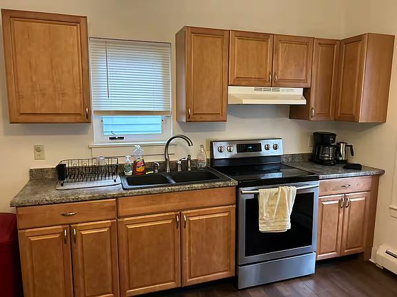 Kitchen comes with all appliances, down to the coffee maker, dishes, pots and pans.