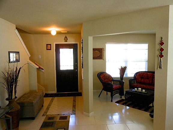Tile entryway, showing formal living room