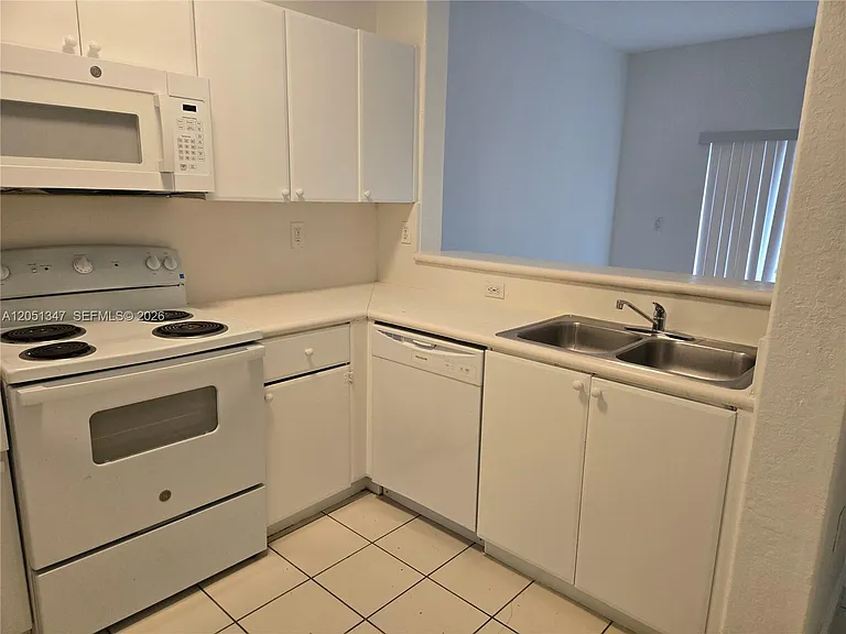 2460 SE 16th Ter #100 — Photo 7