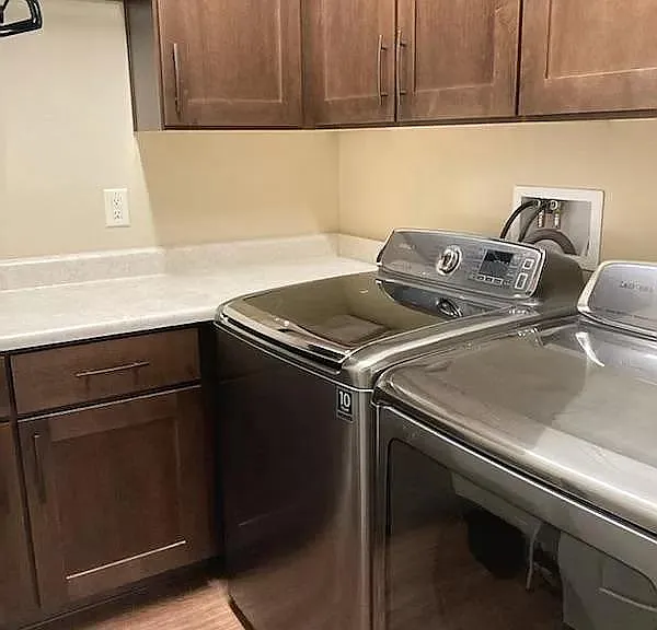 Laundry room with full size Samsung W/D