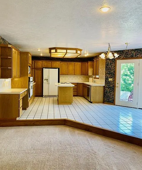 View of open concept kitchen, family room