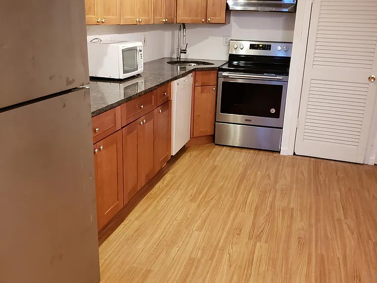 New floors, new stainless steel applicances (dishwasher in this picture has been replaced)