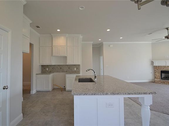 Check out this gorgeous kitchen! Custom cabinets to the ceiling! Large social island!