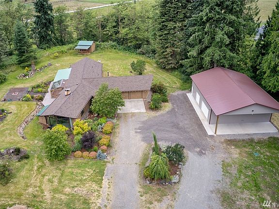 Rambler and dream shop on private 2.76 acres