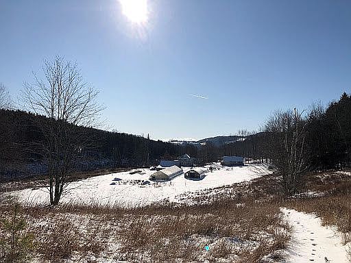View of farm from hill trail