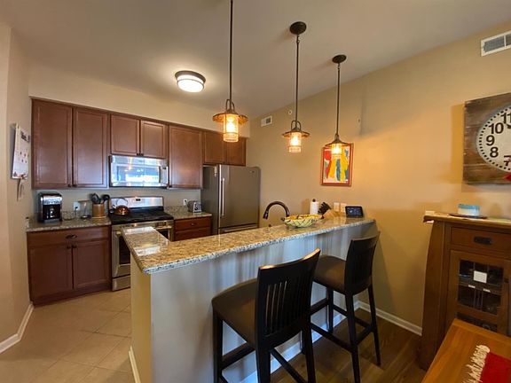 2nd image of 1039 E Summerfield Glen Cir #53-ANN