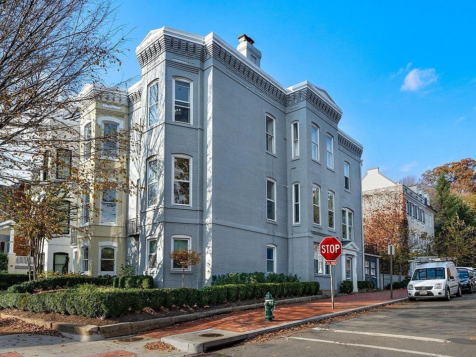 The three unit rowhouse, on the corner of Q and 28th.