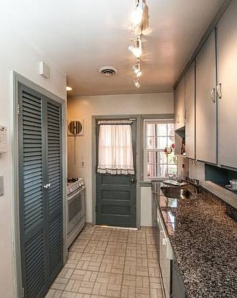 Galley Kitchen with Grani