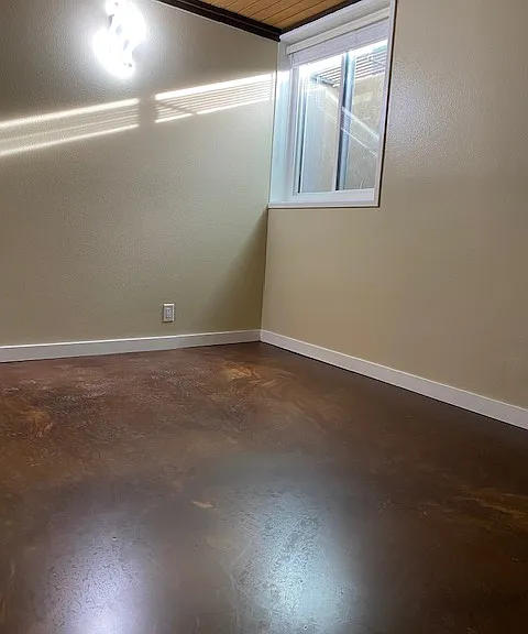 1st Downstairs bedroom with new Apoxy Metallic floor
