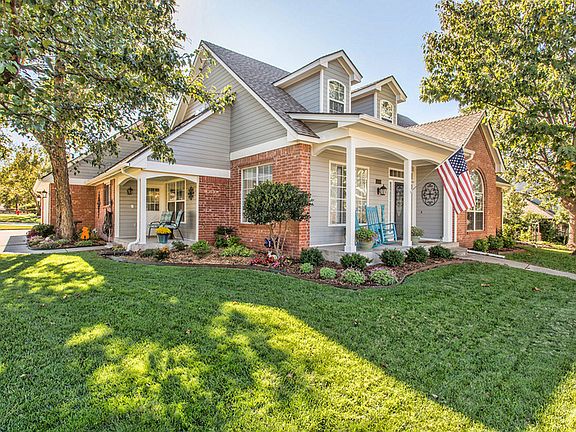 Side porch off utility rm