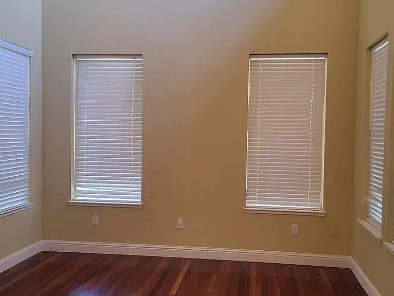 Foyer/sitting room allows plenty of light while trees provide semi-privacy from street