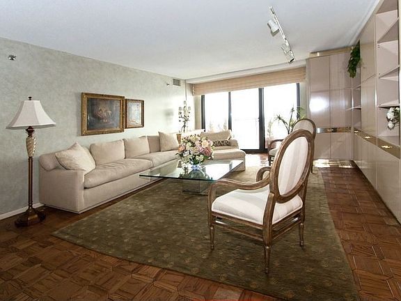 Open Living Room with Sliding Doors to Enormous Terrace