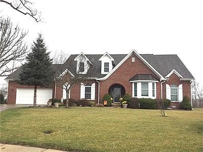 Really nice custom brick home in excellent Hamptons neighborhood on quiet cul-de-sac. Note the arched entrance to front porch.