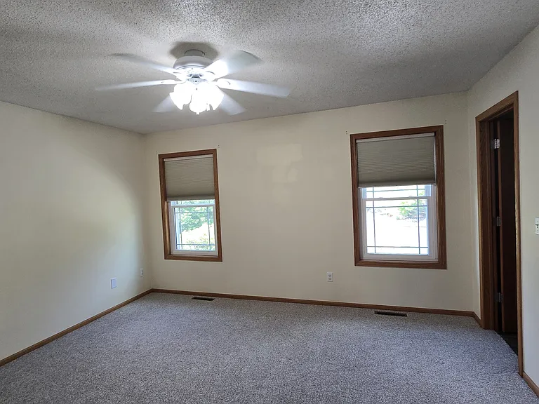 master bedroom with master bath entrance on right