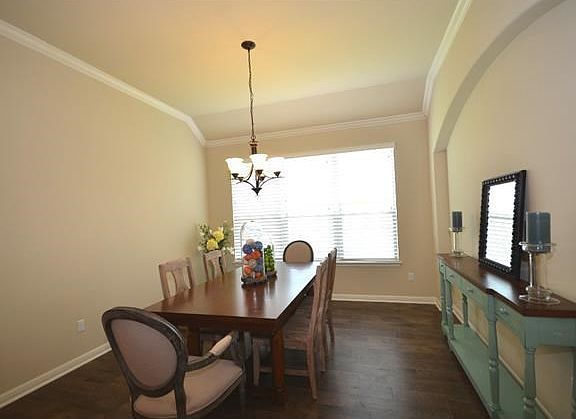 The dining room will easily accommodate a table for eight.