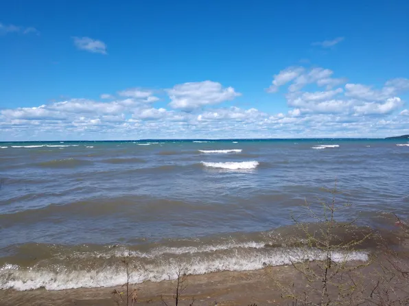 3745 Pointe Dr, Carp Lake, MI 49718