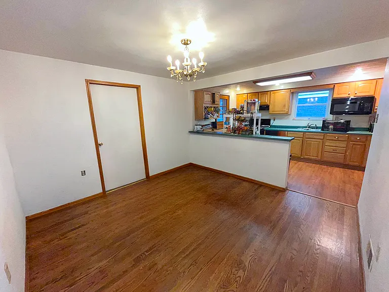 Dining room with eat-in bar & desk open to the kitchen