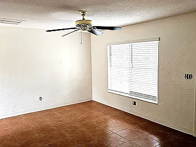 Building Photo - 1357 W Fowler Dr #A