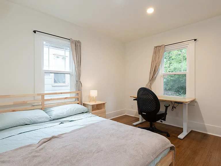 Bedroom with garden view and abundant natural light