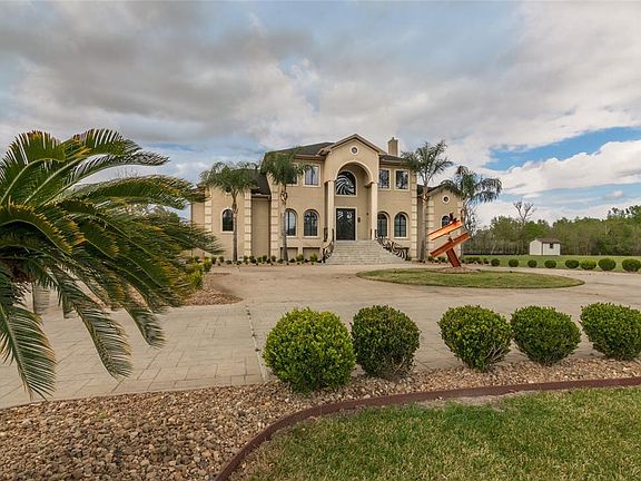 Homes first floor is elevated. Plenty parking for all your toys.