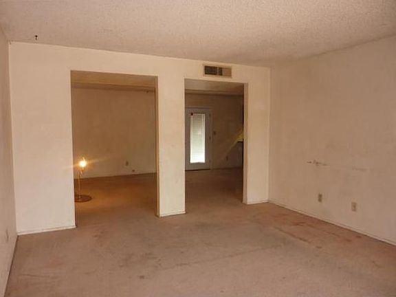View of living room to family room