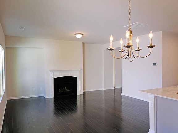 Beautiful Bright Living Room with Fire Place