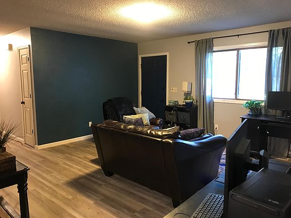 living room and front of house. windows will be replaced in the fall