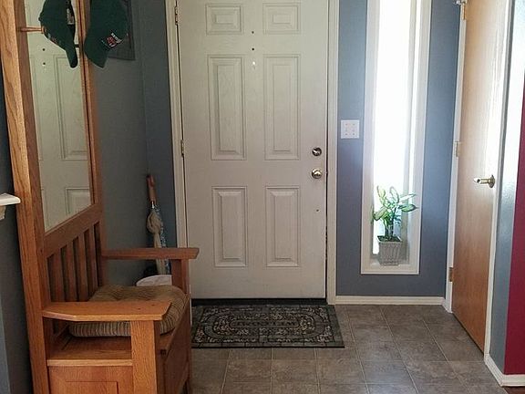 Entrance , coat closet on right
