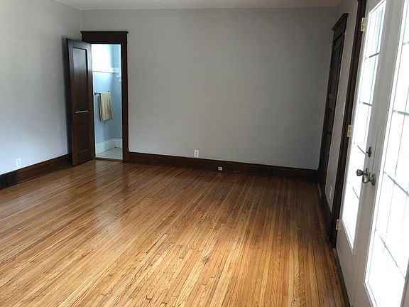 Living room with private half bath