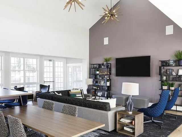 Enjoy Our Spacious Clubhouse with Media Entertainment Center and Meeting Tables at The Flatts Salisbury