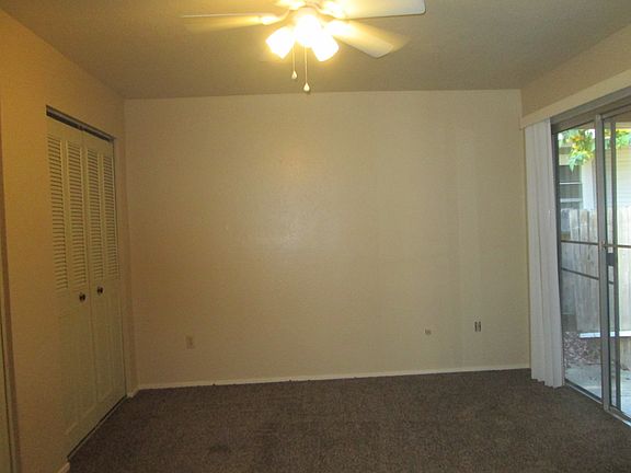 Bedroom with small patio.