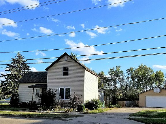 Front of home & 2 car garage