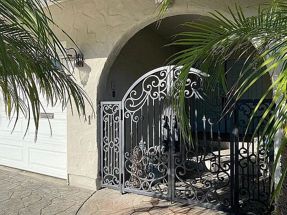 gate to covered entrance