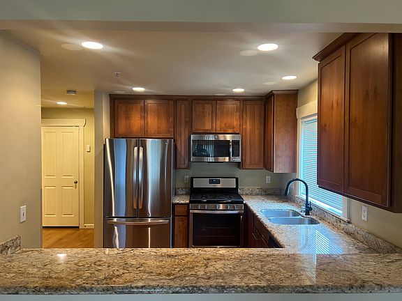 Nice view of kitchen with barstool seating