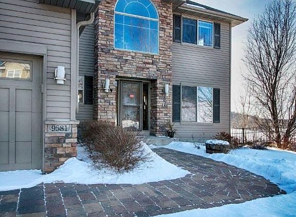 Great curb appeal with paved driveway and walk