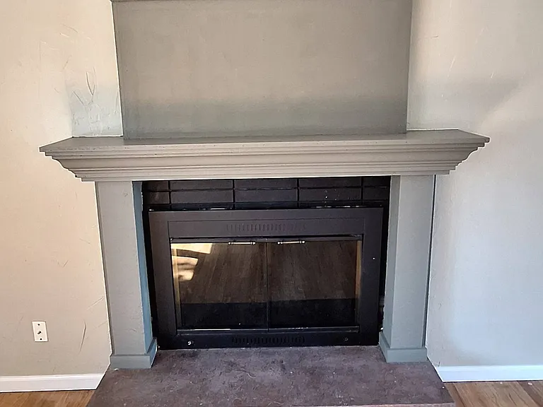 Newly painted fireplace!