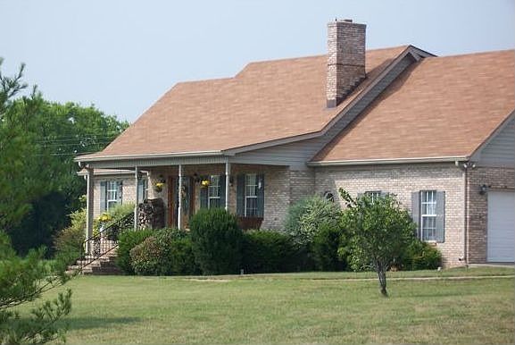 Custom brick on 5.1 acres!