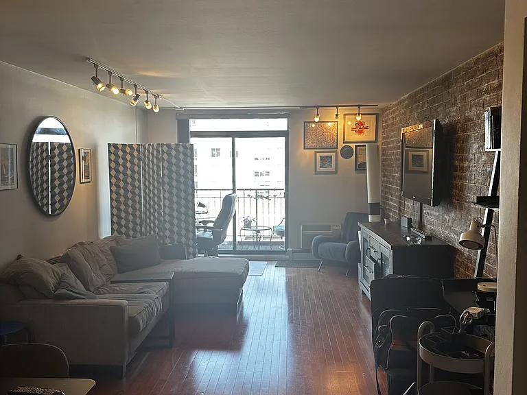 Main room: living/dining, facing balcony