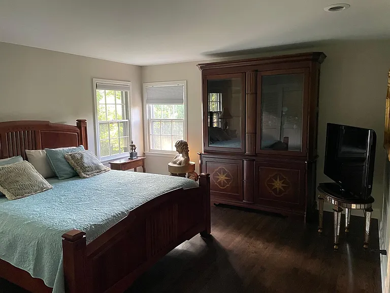 Large hutch with bottom storage. Three large closets, King bed with nightstand.