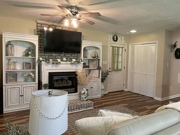 Living room with propane fireplace.